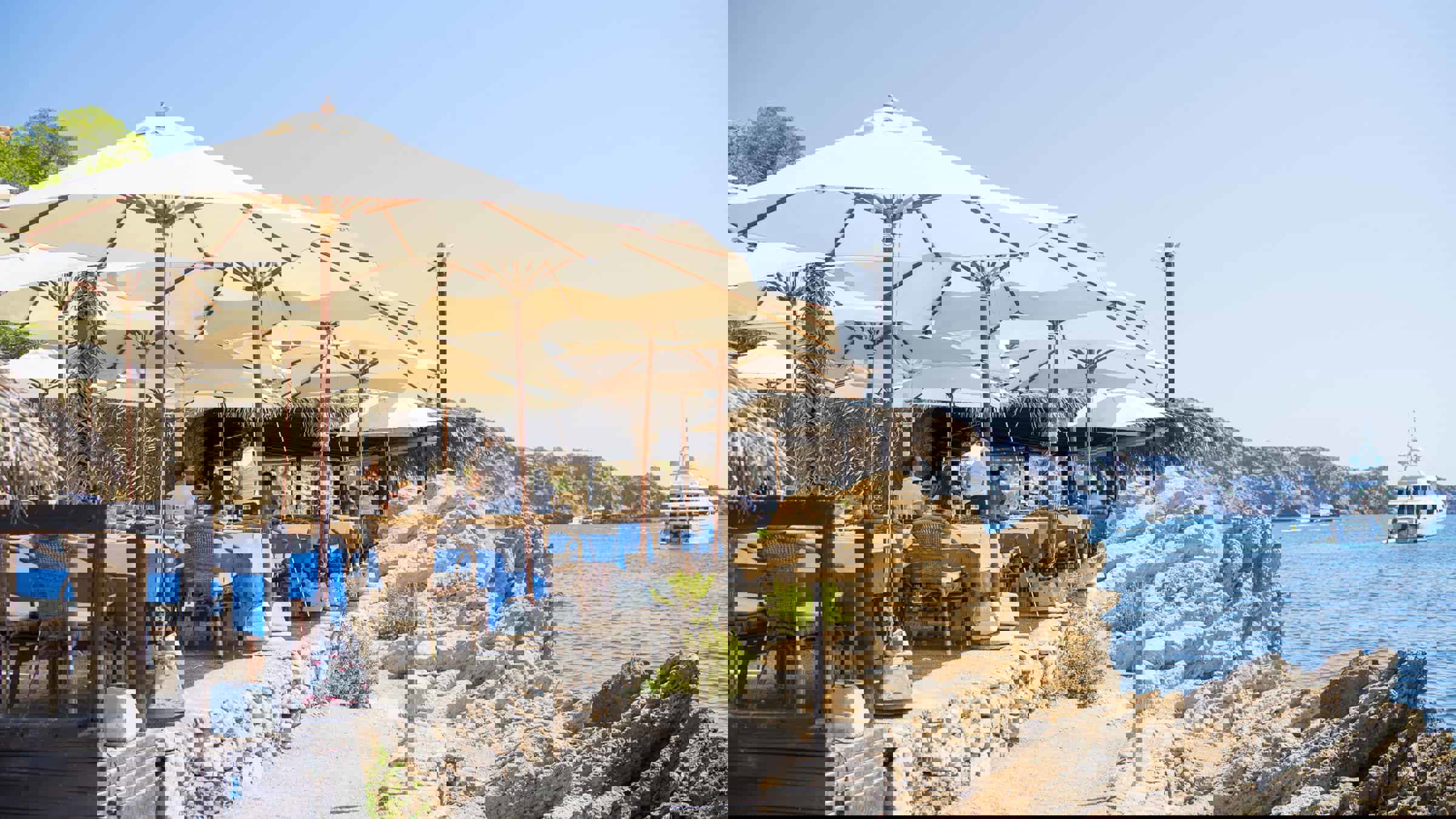 People Seating By The Sea At The Terrace (1)