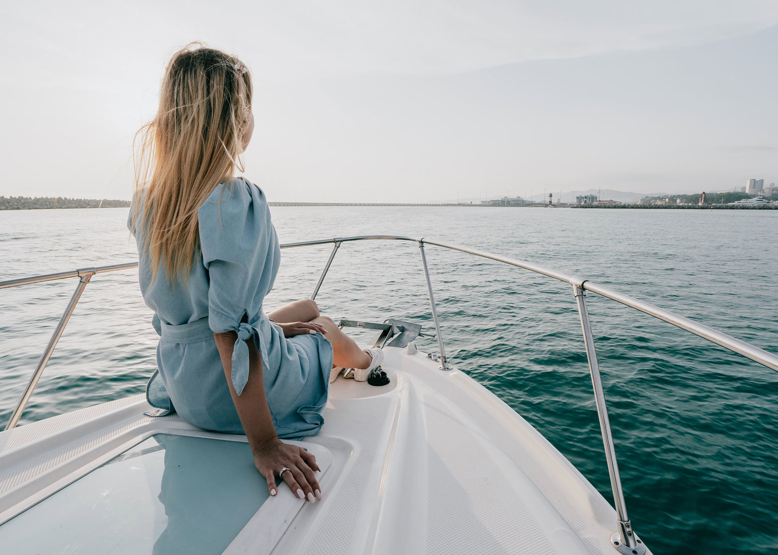 Dynamic Lives Concierge Woman Sat On Front Speedboat Dmitry Tomashek